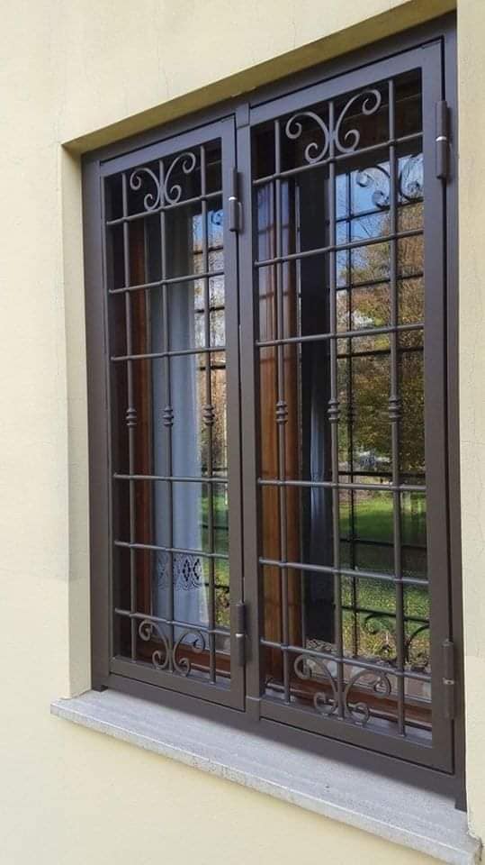 Proteções de janelas feitos com ferro forjado